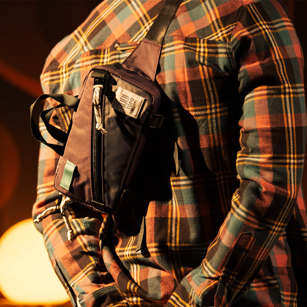General front view of Topo Designs Mini Quick Pack in "Nightshade / Slate"