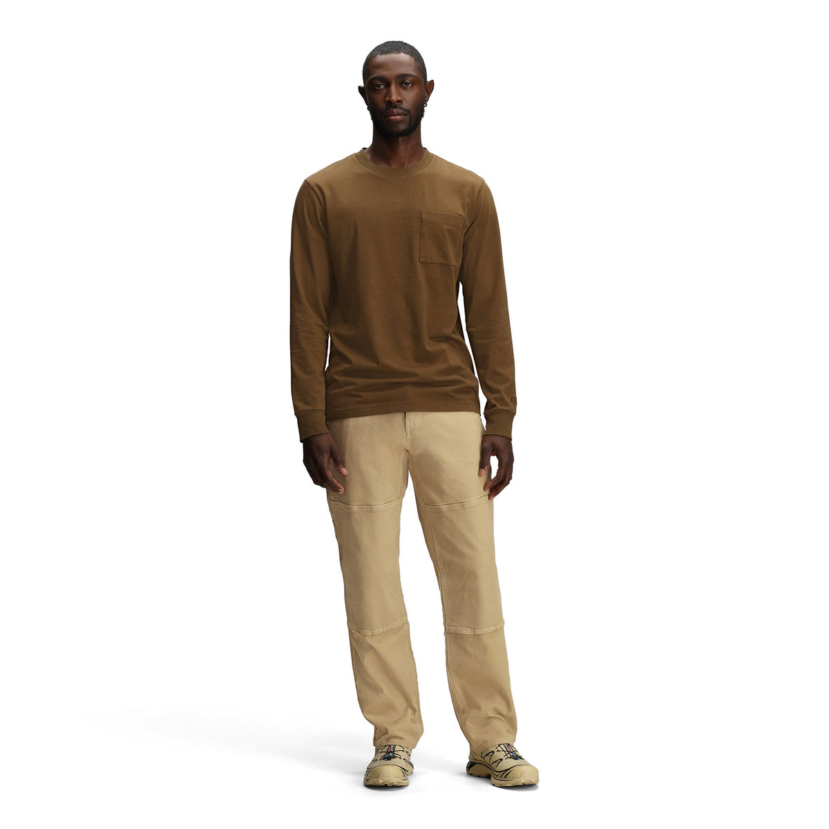 General front model shot of Topo Designs Utility Pants - Men's in "Sahara"