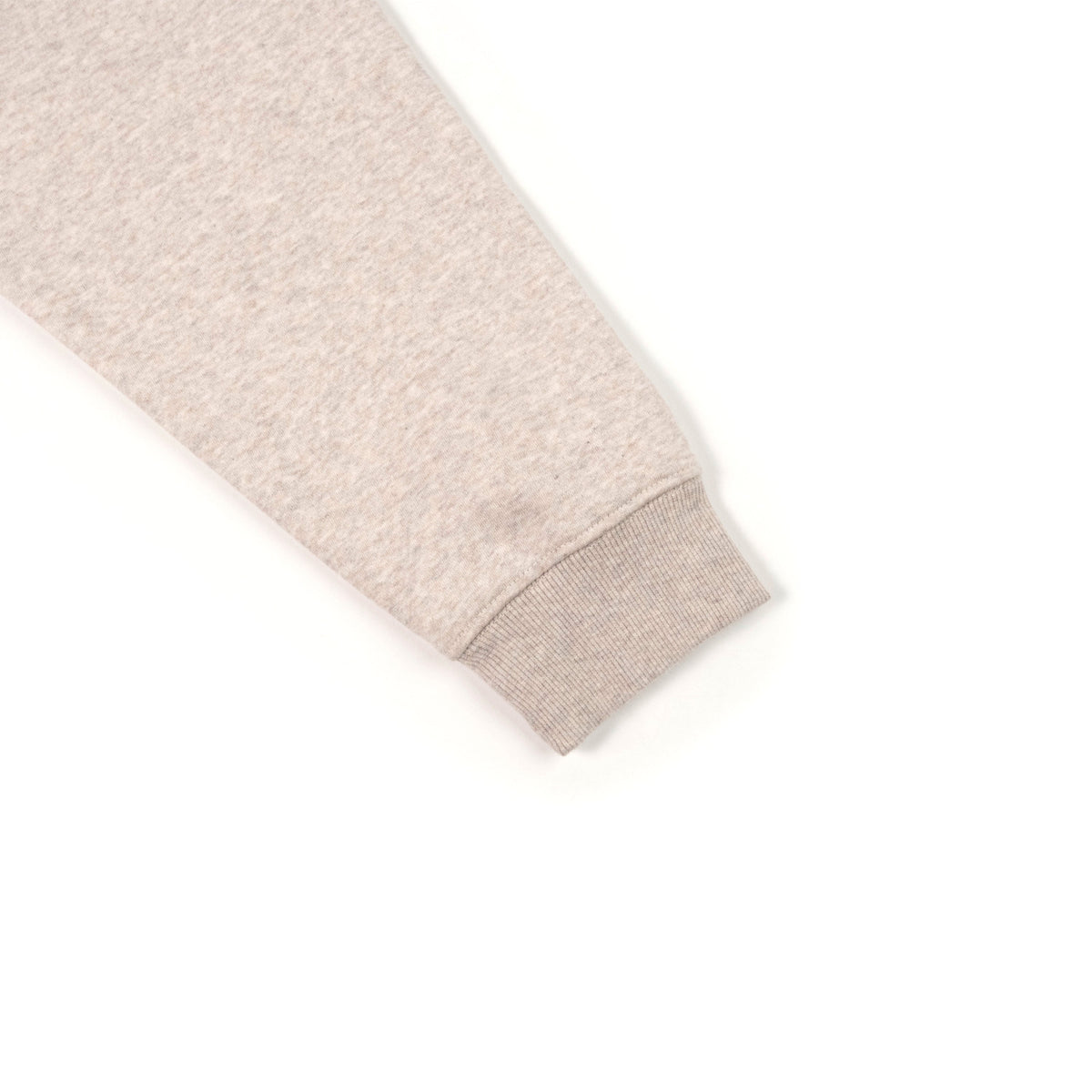 General Detail shot of Topo Designs Alpine High Label Hoodie in "Oatmeal Heather"