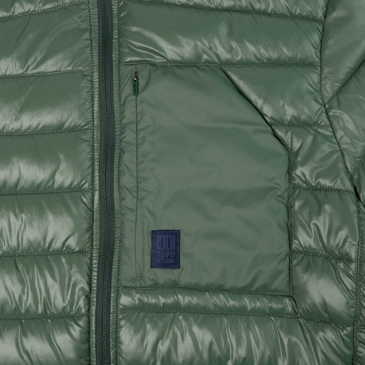General Detail shot of Topo Designs Townie Puffer Jacket - Men's in "Forest"