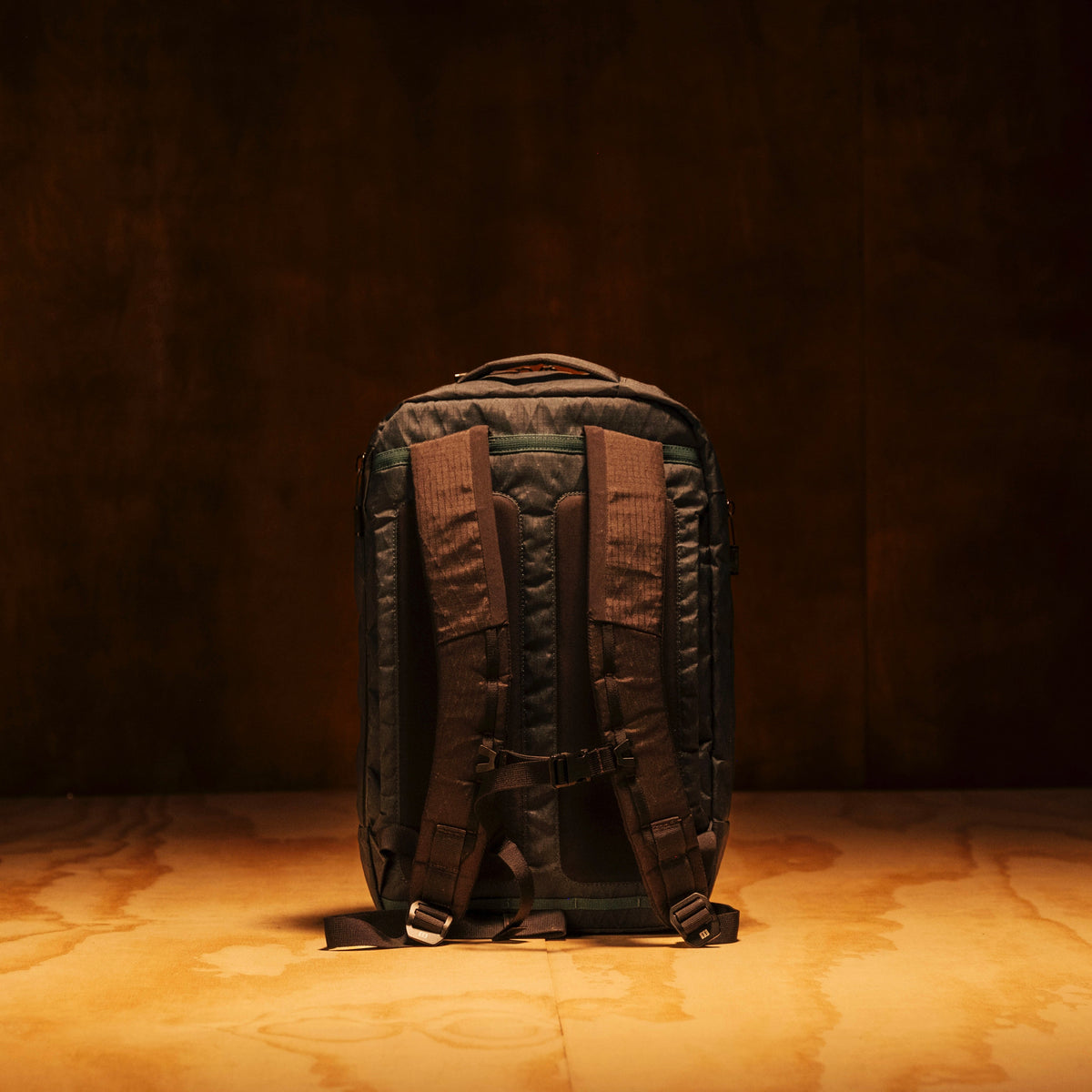 General shot of Topo Designs Global Pro Backpack shown in studio setting showing backpack straps