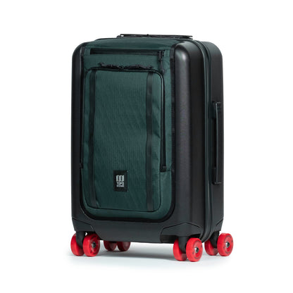 Front quarter shot of Topo Designs Global Pro Travel Roller Bag in "Dark Pine"