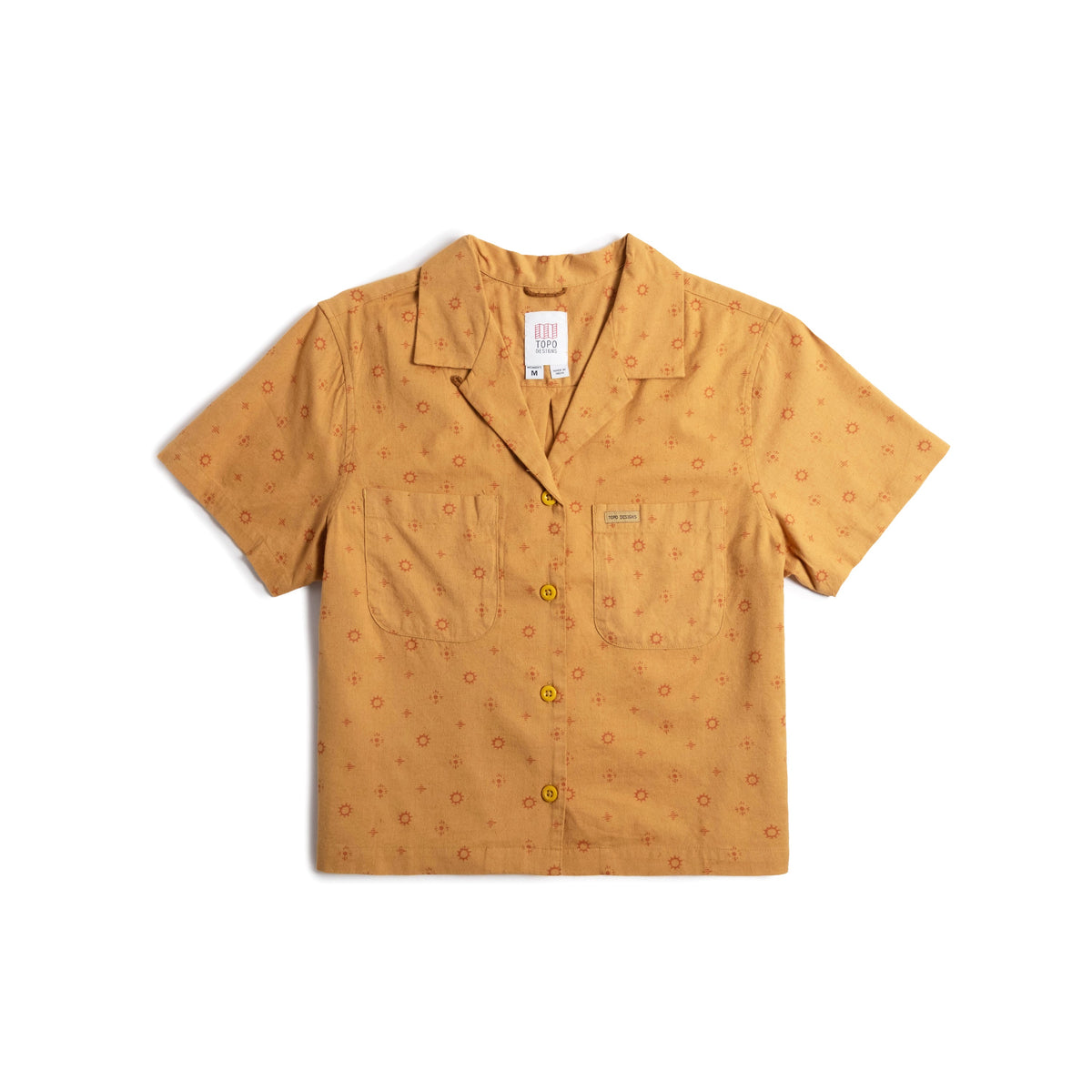 Front flat lay image on white background of Topo Designs Daytripper Short Sleeve Shirt - Women's in "Tossed Motif Goldenrod"