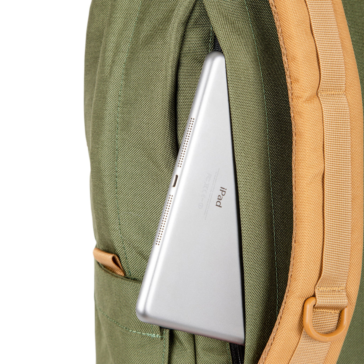 General shot of external laptop sleeve access on back of Topo Designs Daypack Classic 100% recycled nylon backpack for work or school in olive green.