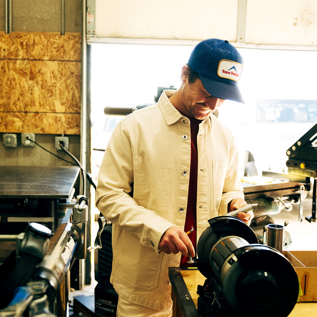 General lifestyle image of Patch Mesh Trucker - Retro Icon hat in "French Blue"
